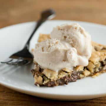 Skillet chocolate chip cookie on a plate.