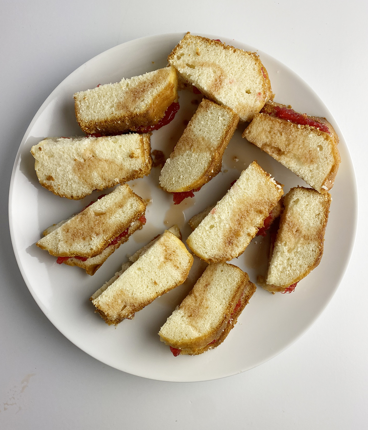 Cake and jam pieces sprinkled with cream sherry.