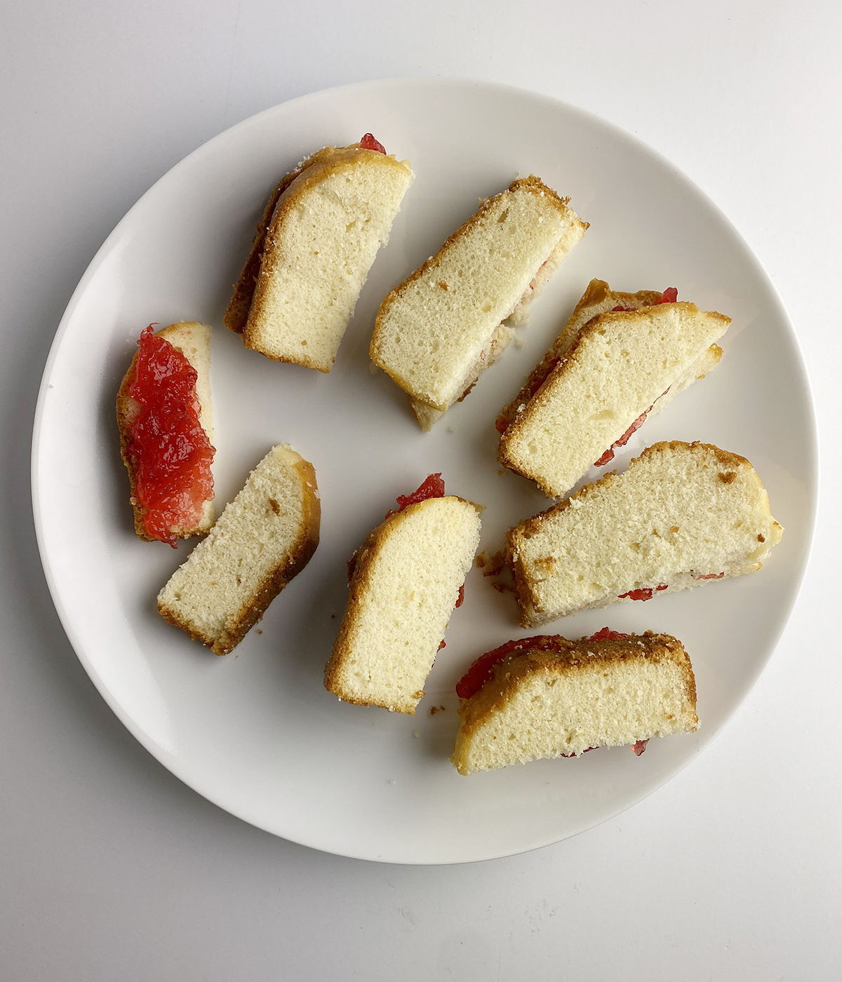 Cake and jam sandwiches for Irish trifle.