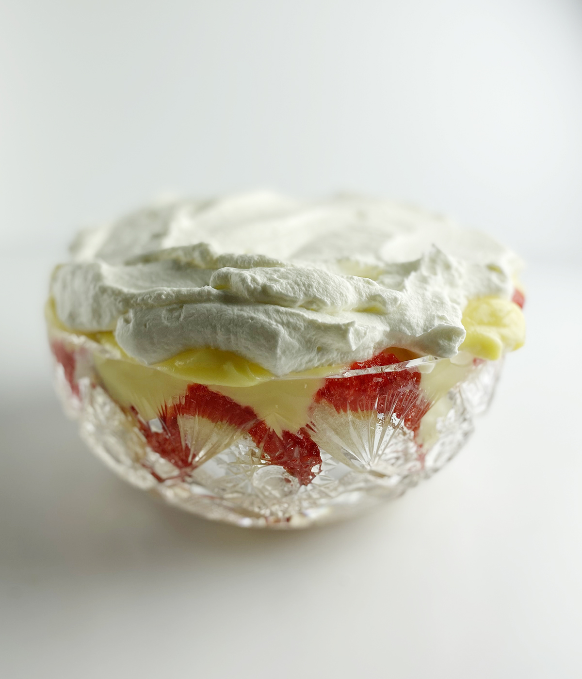 Irish trifle with whipped cream topping.