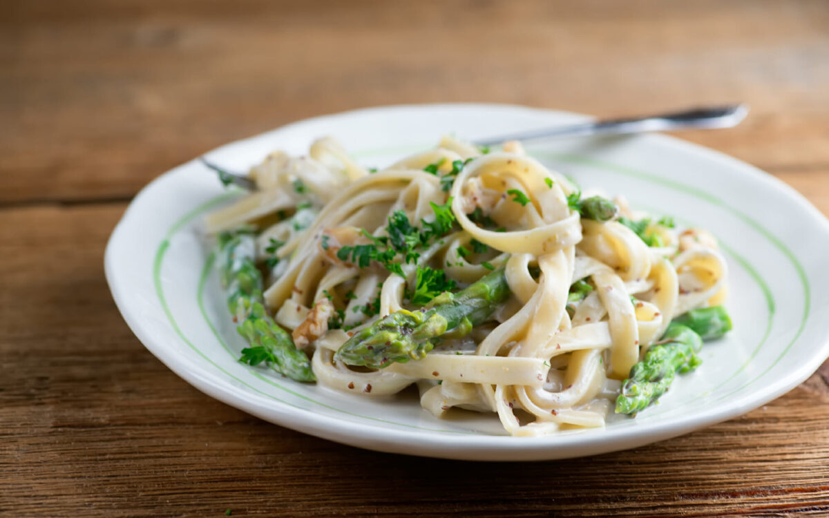Pasta with asparagus and goat cheese.