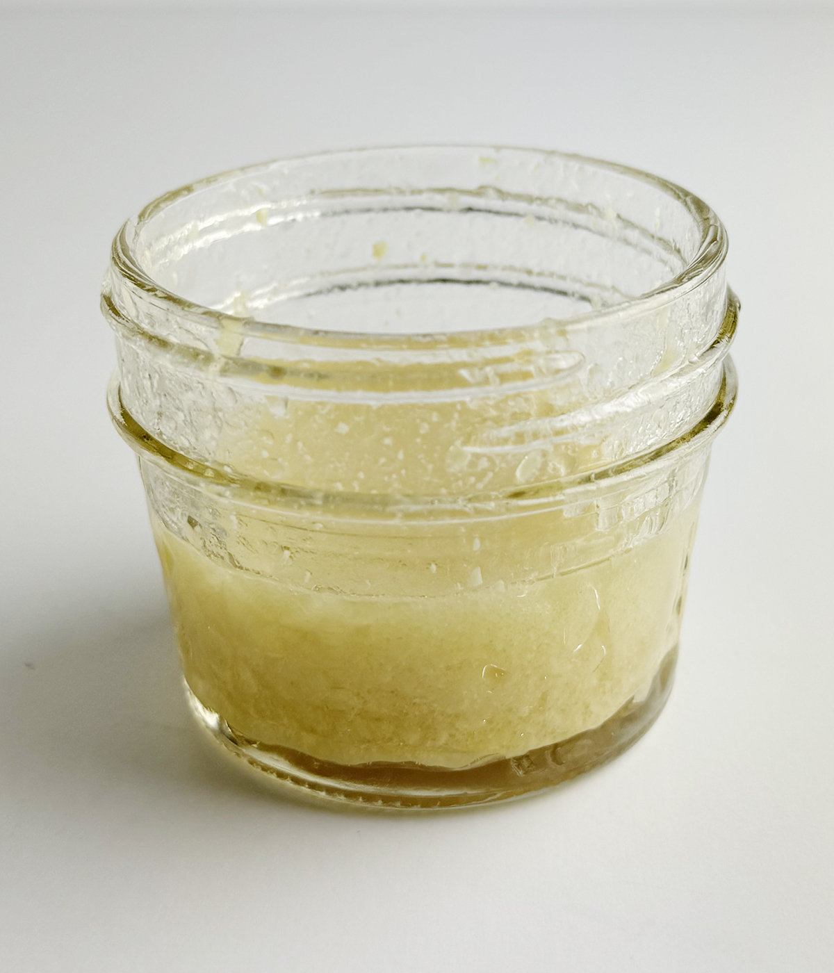 Mustard lemon dressing in a jar.