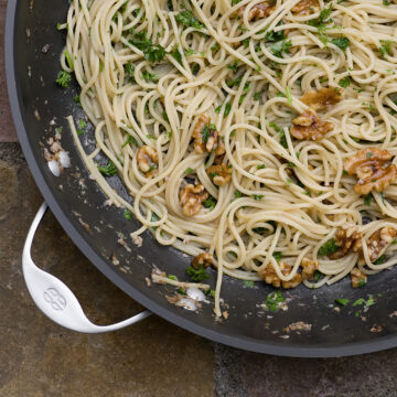 Pasta with Anchovy Sauce in a skillet.