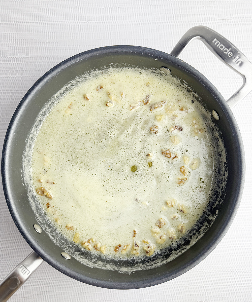 Walnuts cooking in butter.