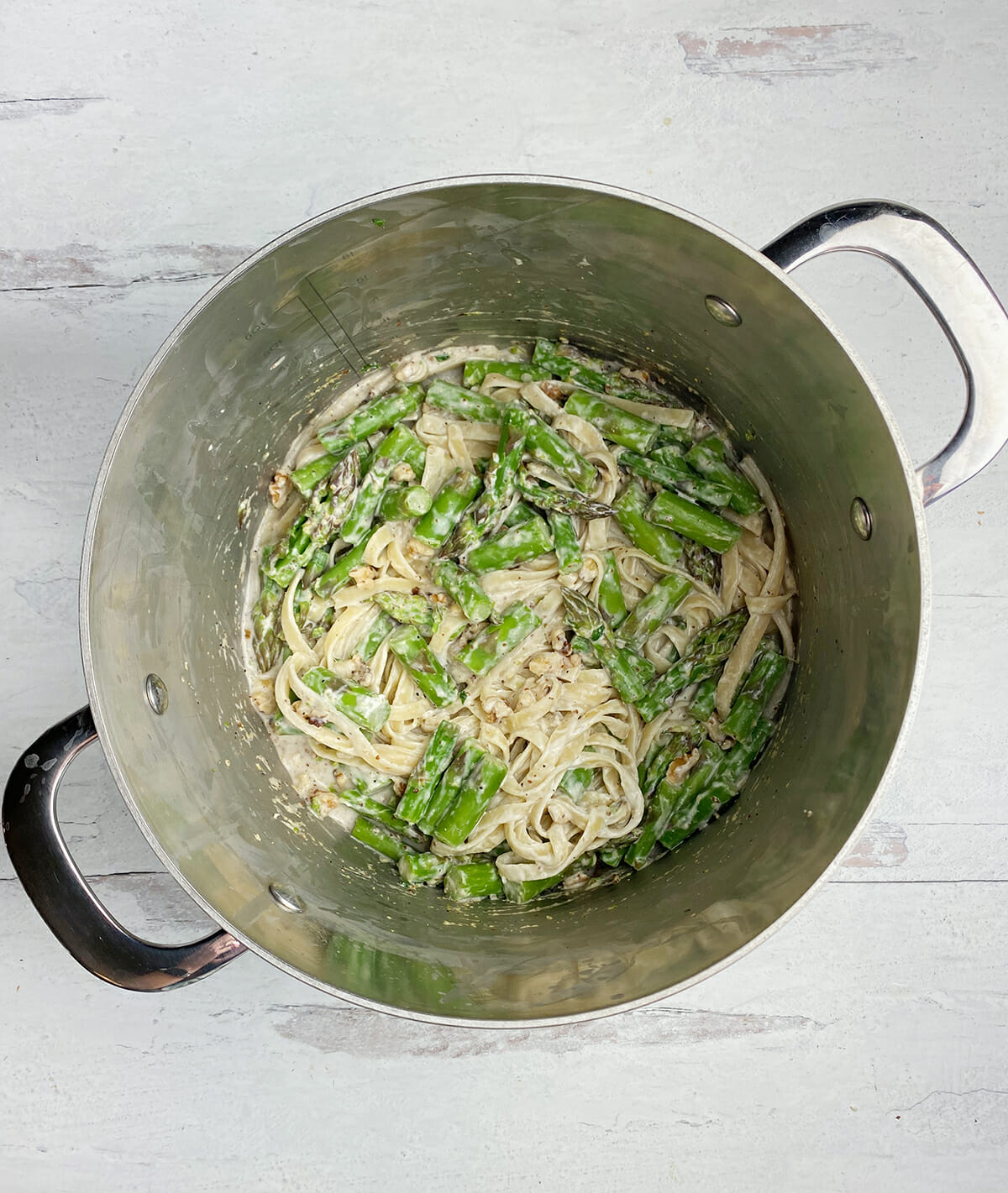 Mixed goat cheese pasta in a pot.