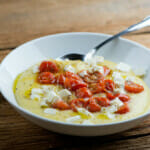 Easy tomato mozzarella polenta in a bowl.