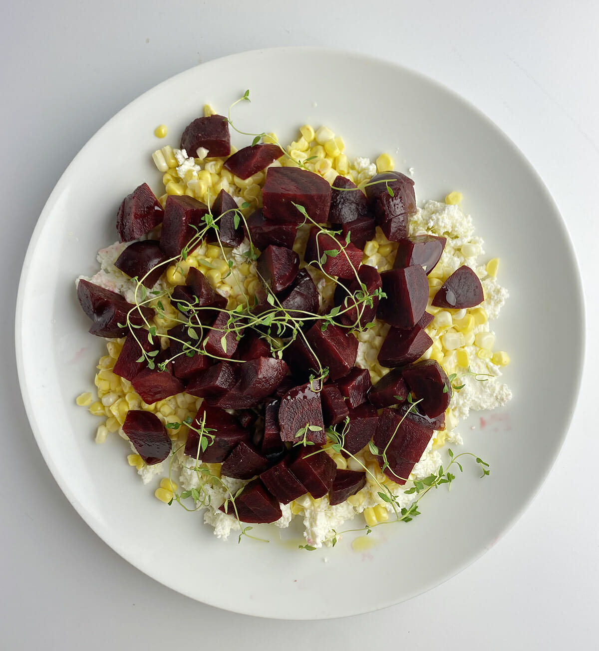 corn and beet salad with olive oil and thyme