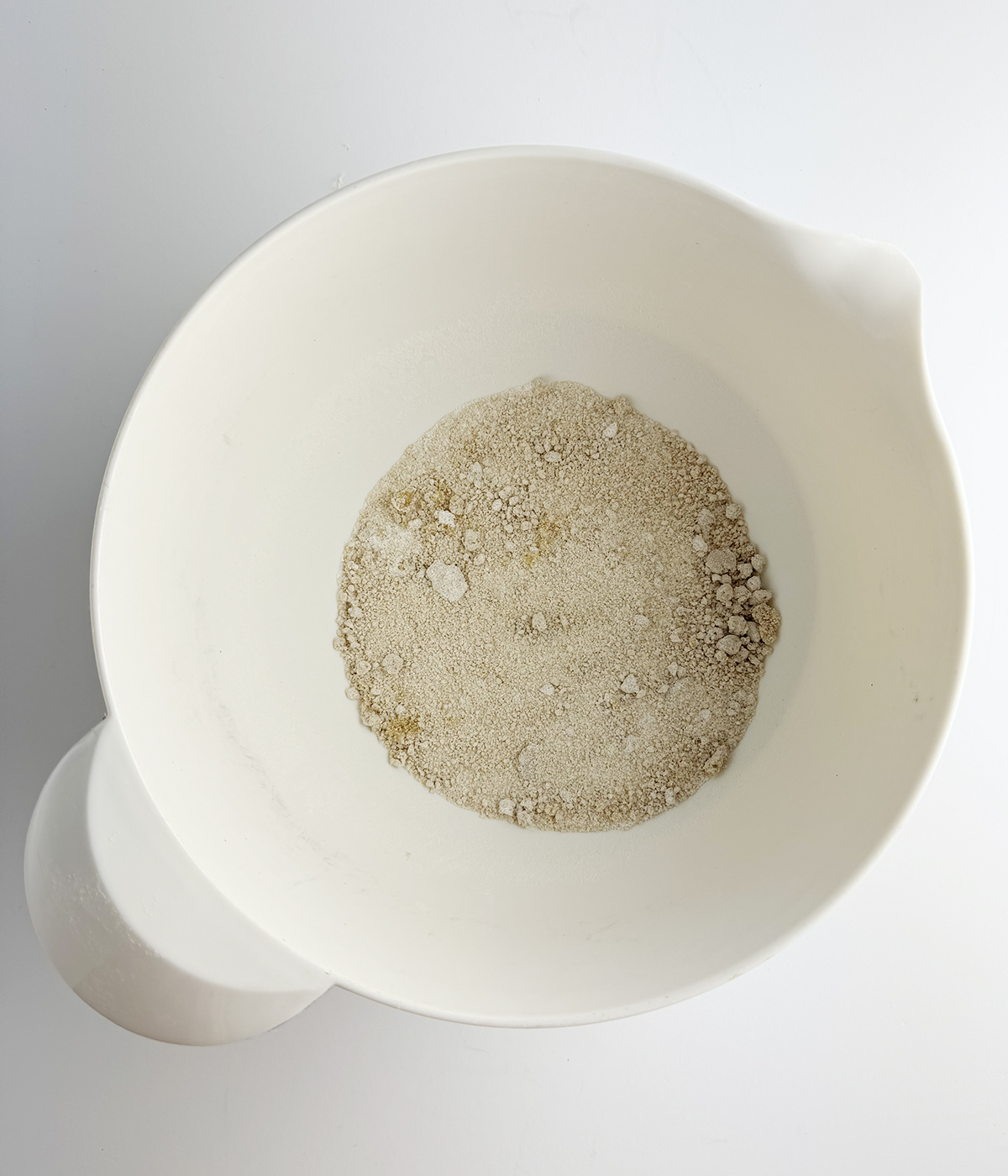 Brown sugar and flour mixture in a mixing bowl.