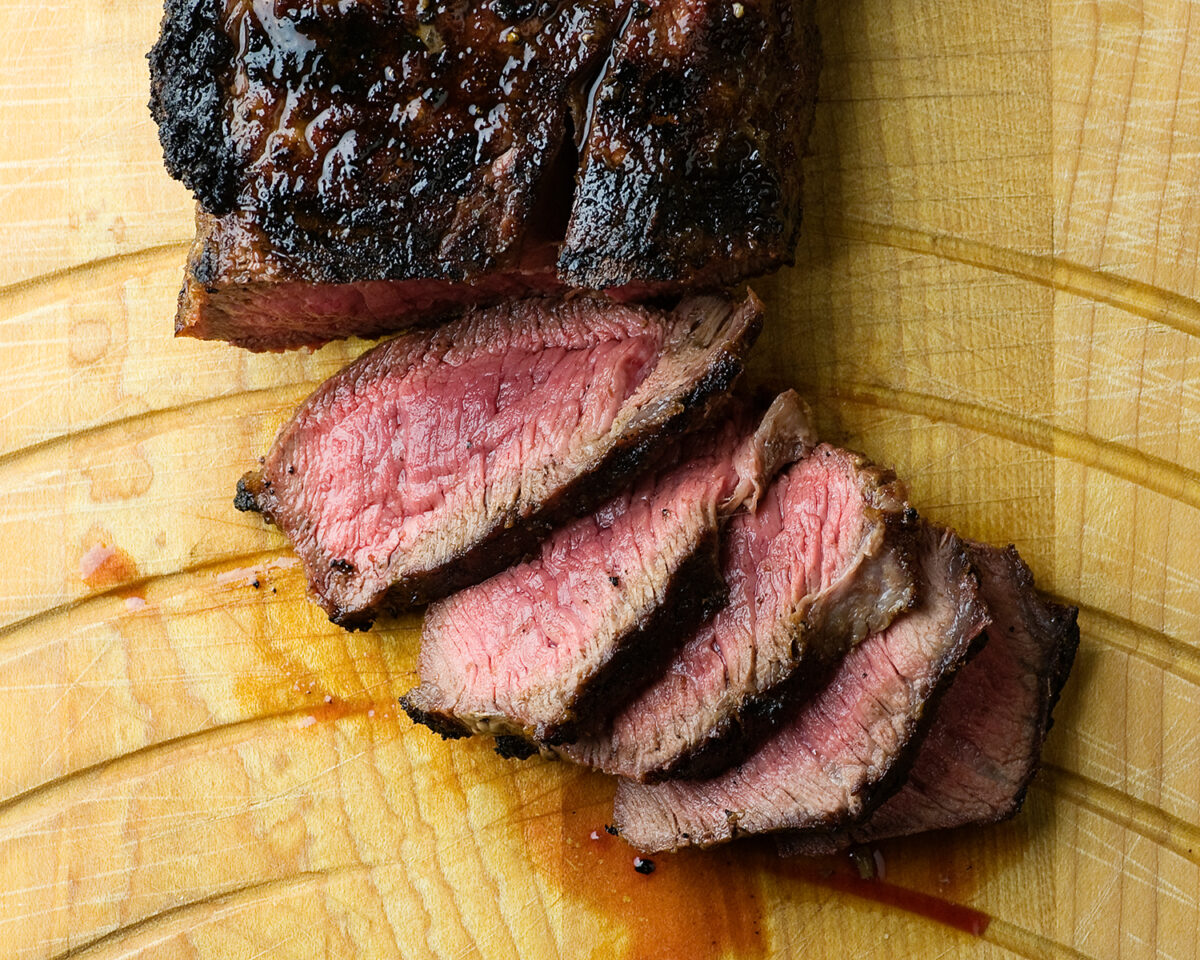 Perfect grilled steak on a cutting board.