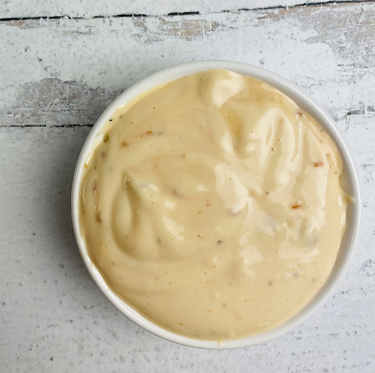 Shrimp louie dressing in a bowl.