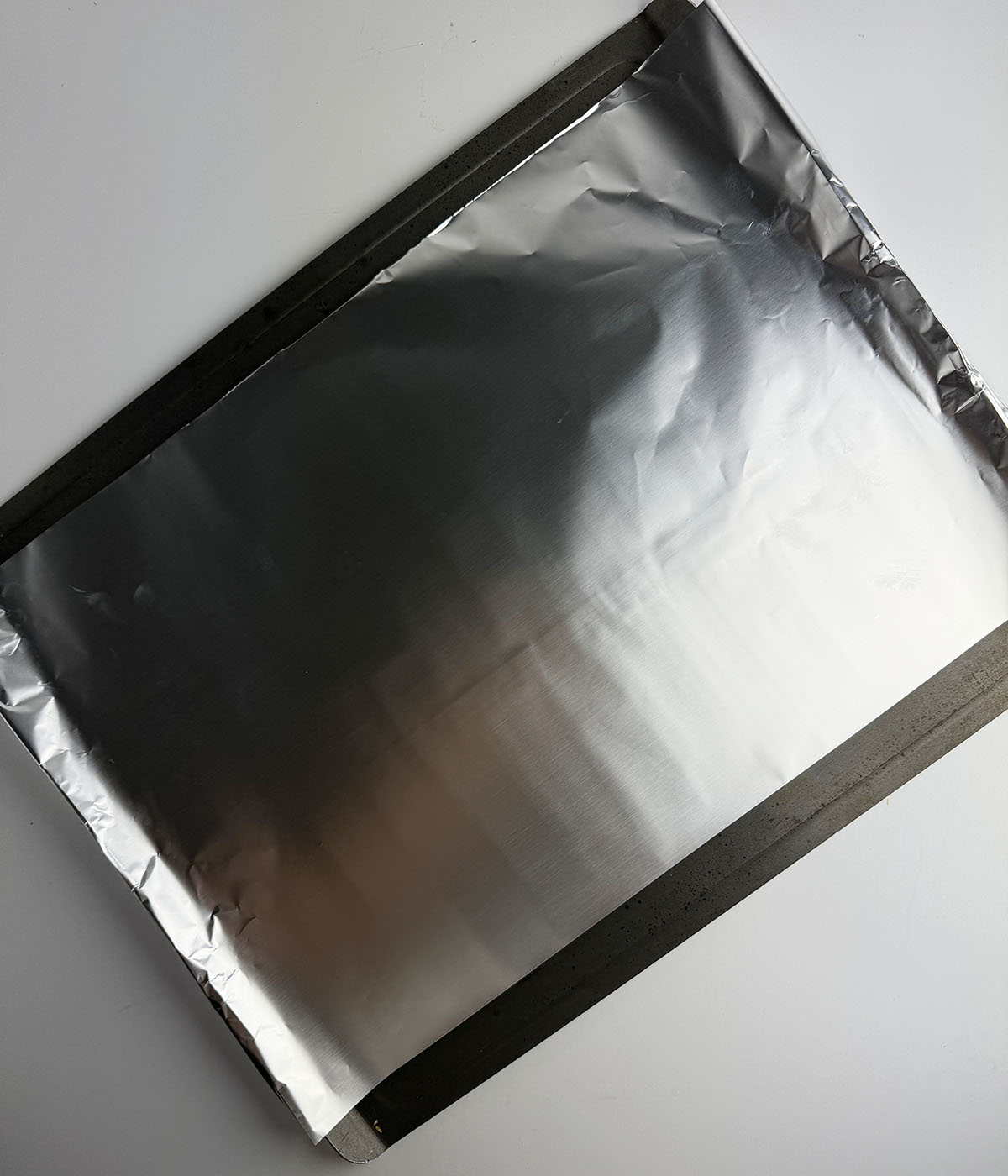Cookie sheet lined with foil.