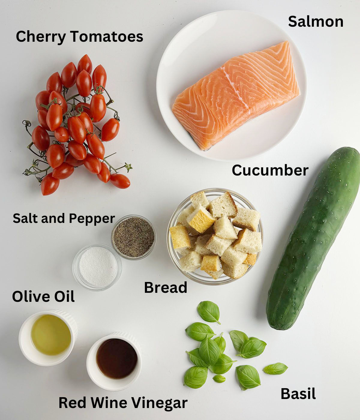 Ingredients needed to make salmon panzanella salad.