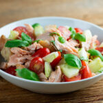 Salmon Panzanella in a bowl.