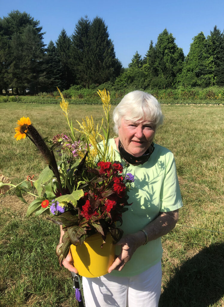 Mama with wildflowers