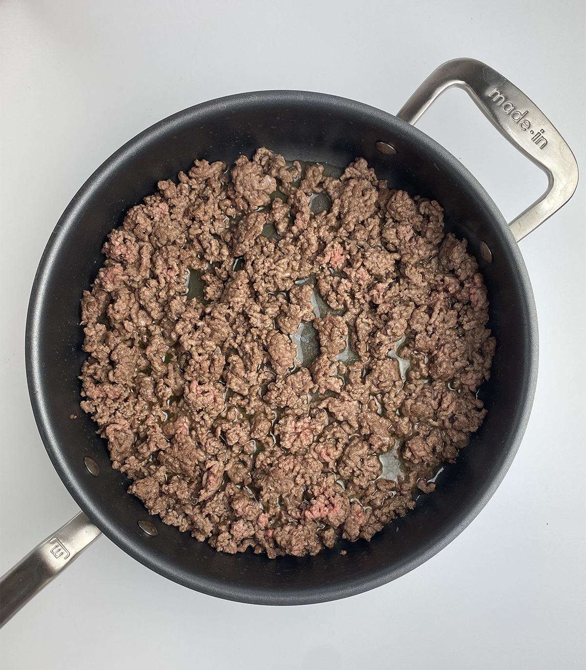 cooked ground beef in pan