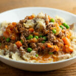 Upside down shepherds pie in a bowl.