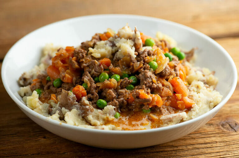 Upside down shepherds pie in a bowl.