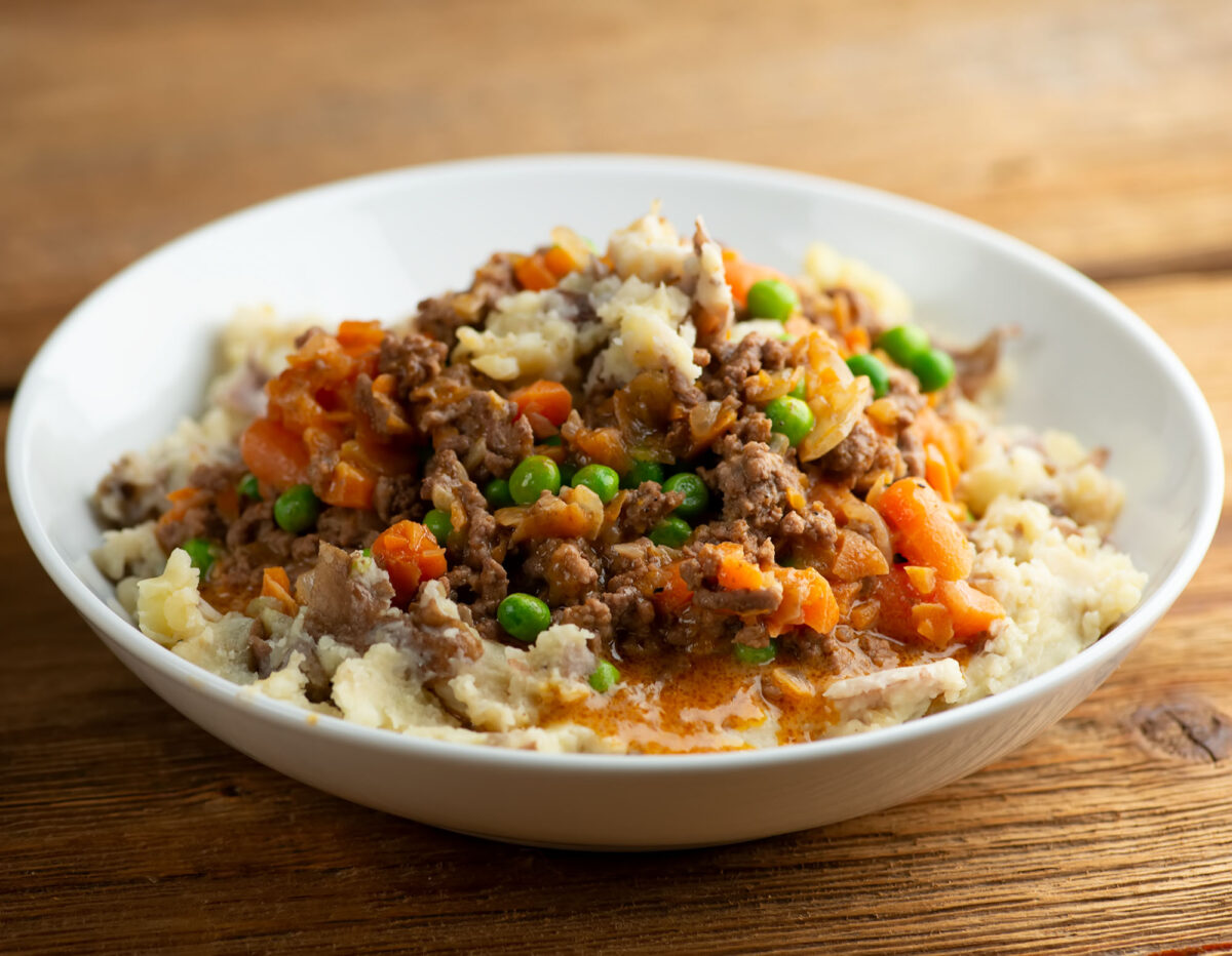 Upside down shepherds pie in a bowl.