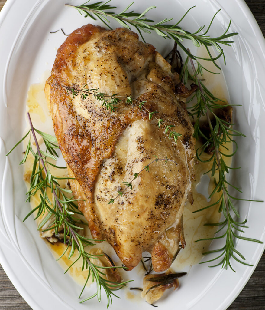 Roasted turkey breast on a platter.