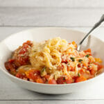 Pasta with Clam Marinara Sauce in a bowl with a fork.