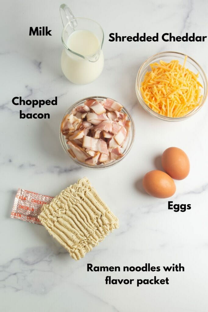 Breakfast Ramen Ingredients onm a marble counter.