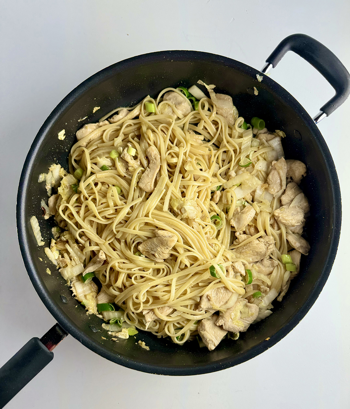 Longevity noodles in a skillet.
