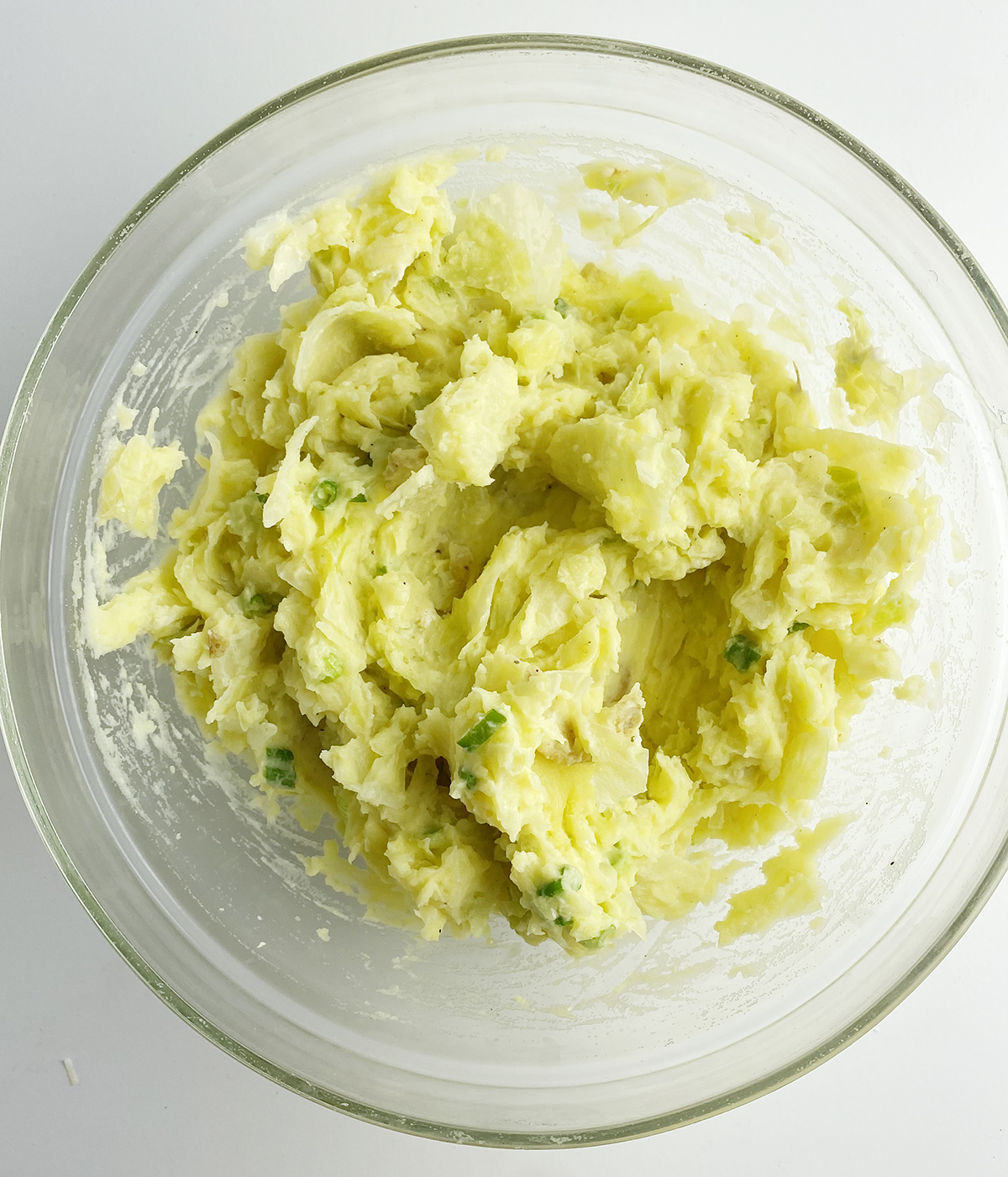 Irish colcannon mixture in a mixing bowl.