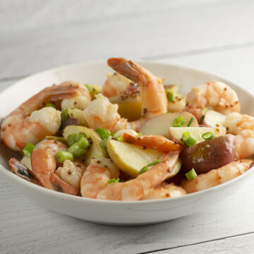 Shrimp and baby potato salad in a bowl.