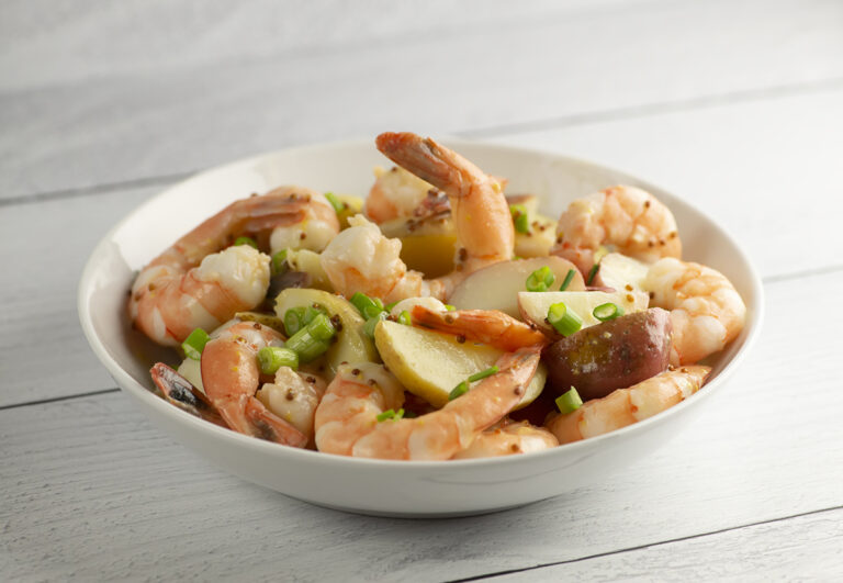 Shrimp and baby potato salad in a bowl.
