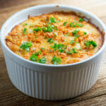 Dorito Chicken Casserole on a wooden counter.