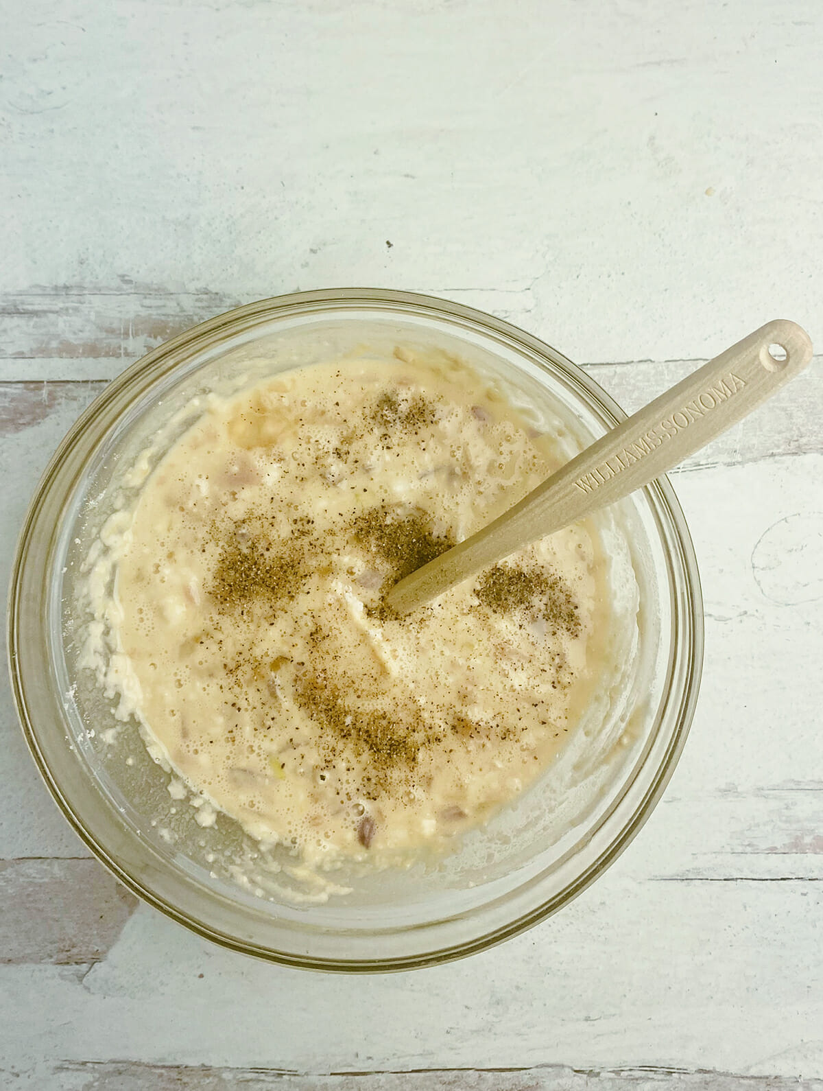 Clam fritter batter in a mixing bowl.