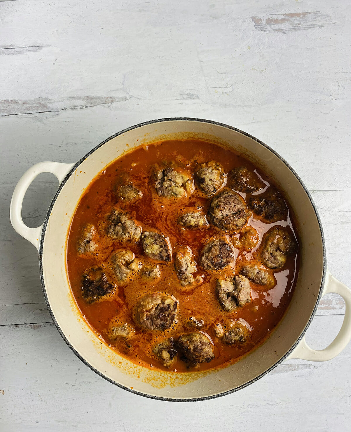 one pot spaghetti and meatballs meatballs cooking in sauce