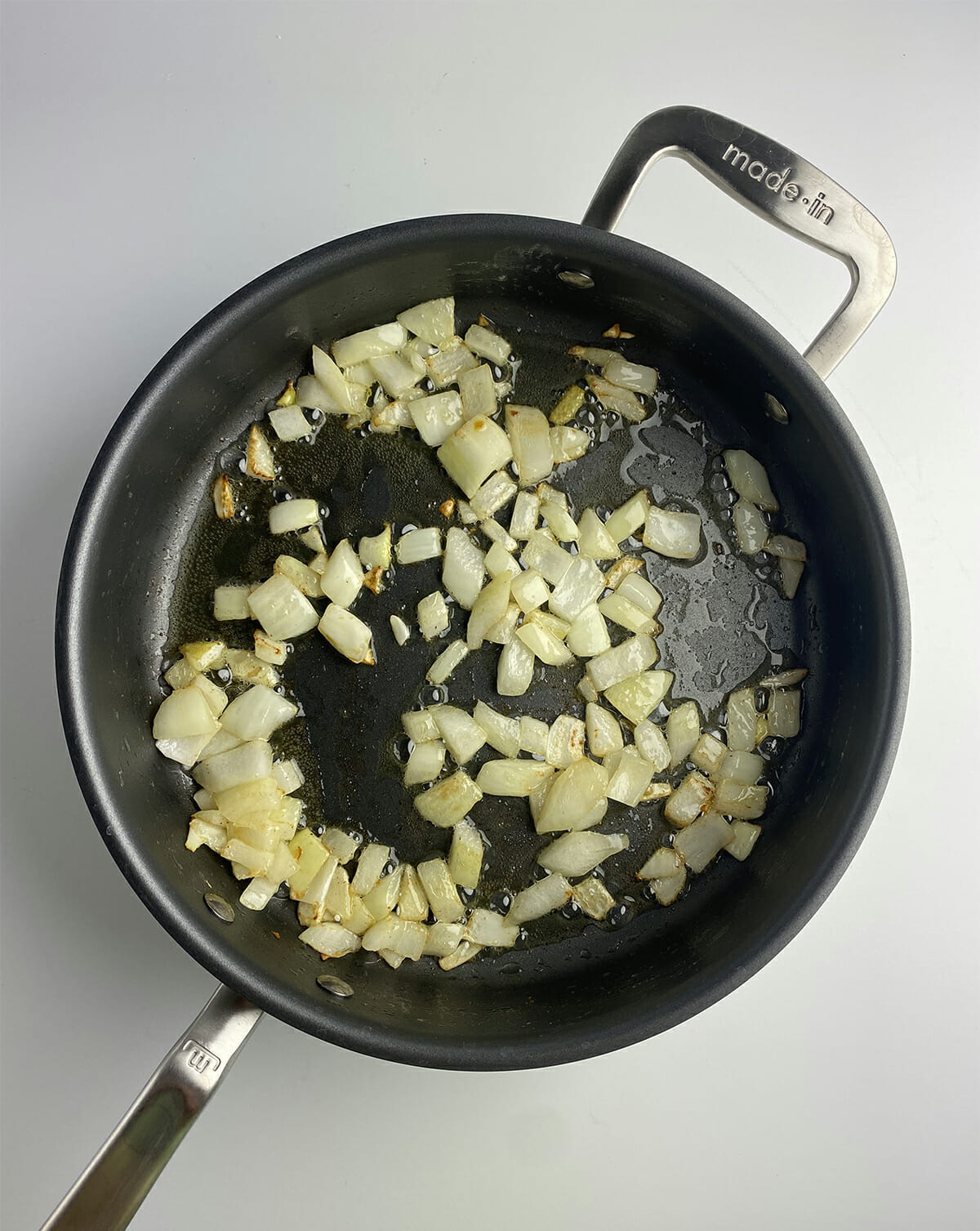 sauteed onions in frying pan