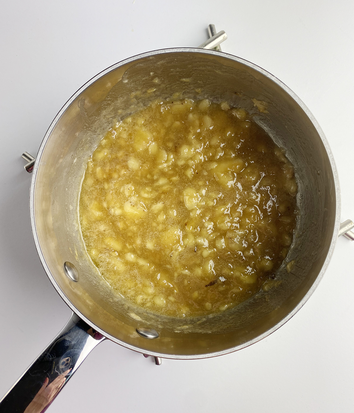 Banana jam cooking in a pot.