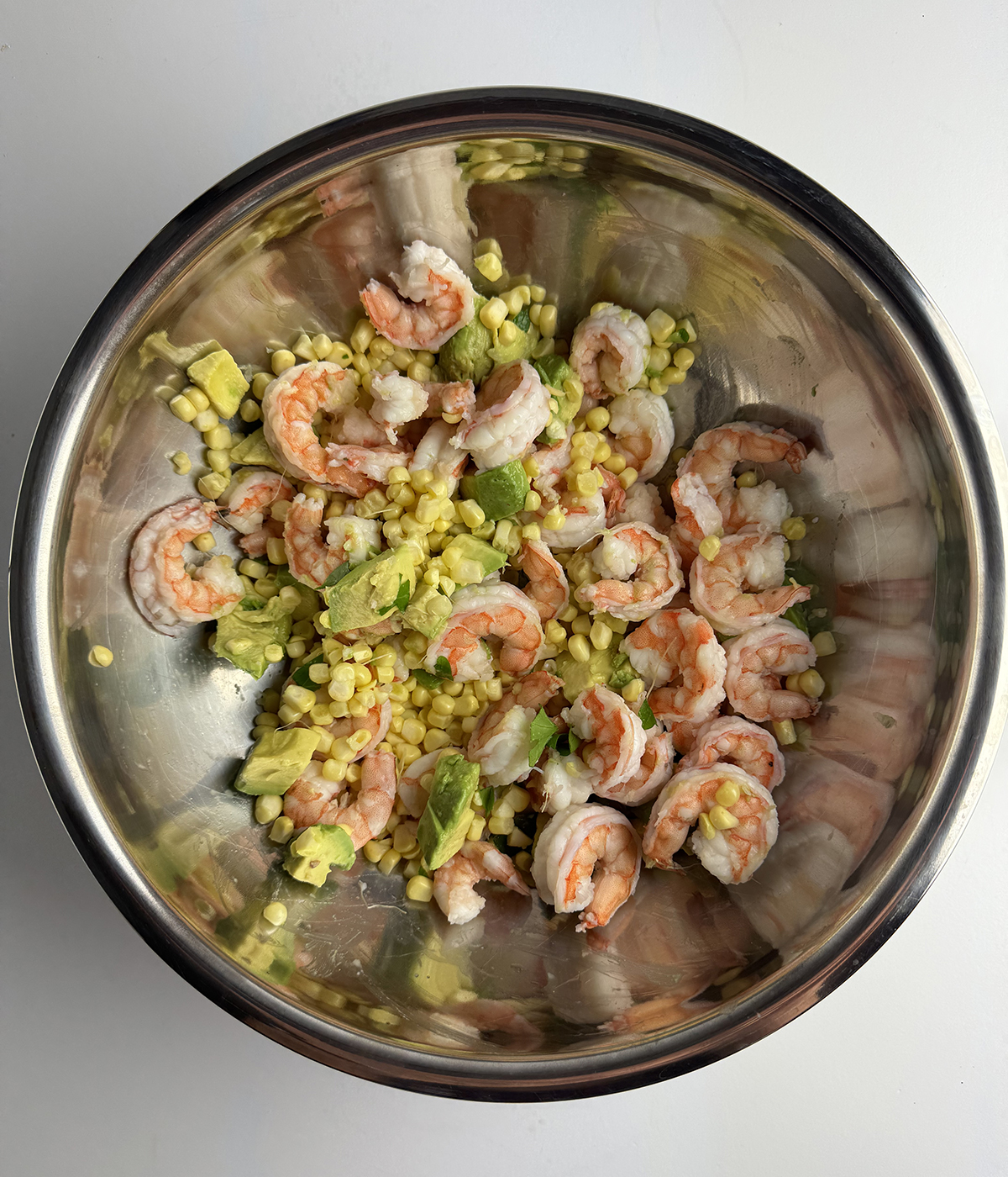 Coconut shrimp salad in a bowl.