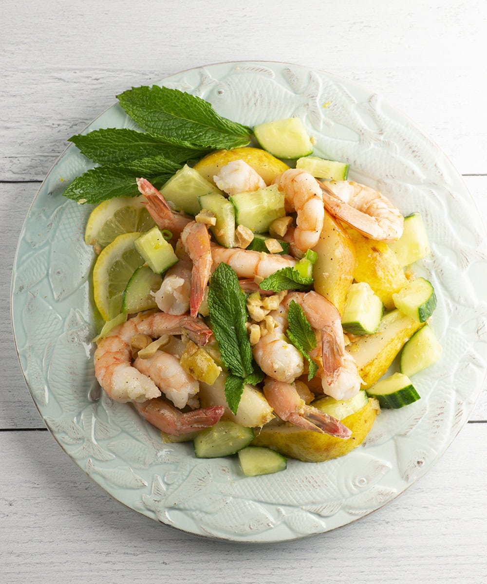 Finished summer shrimp salad on a plate.