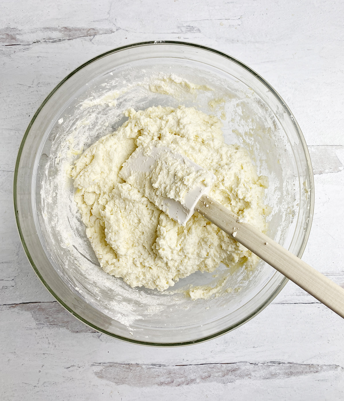 Ricotta dumpling batter in a bowl.