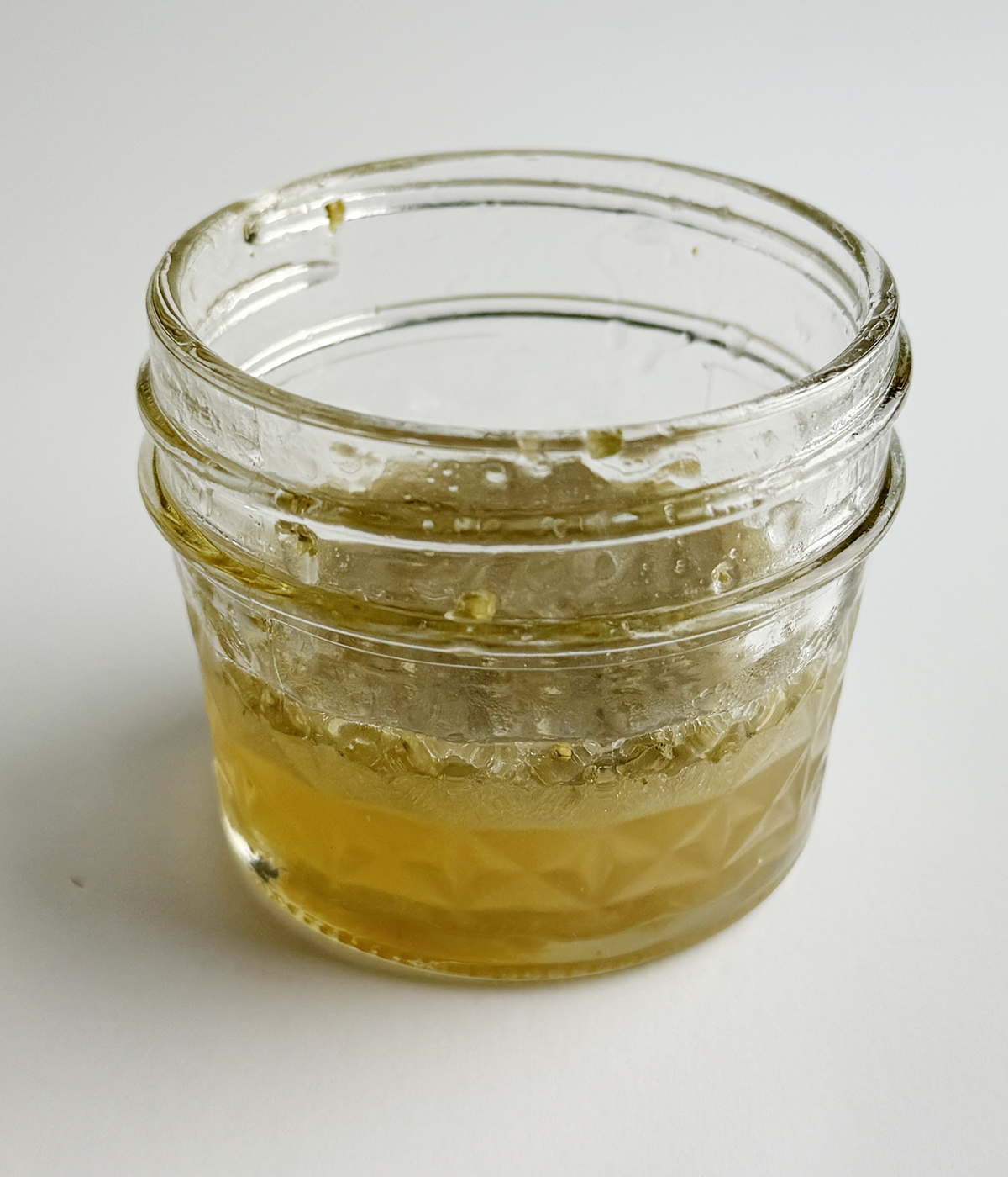 Salad dressing in a mason jar.