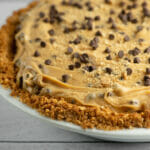 Chocolate chip peanut butter pie on a counter.