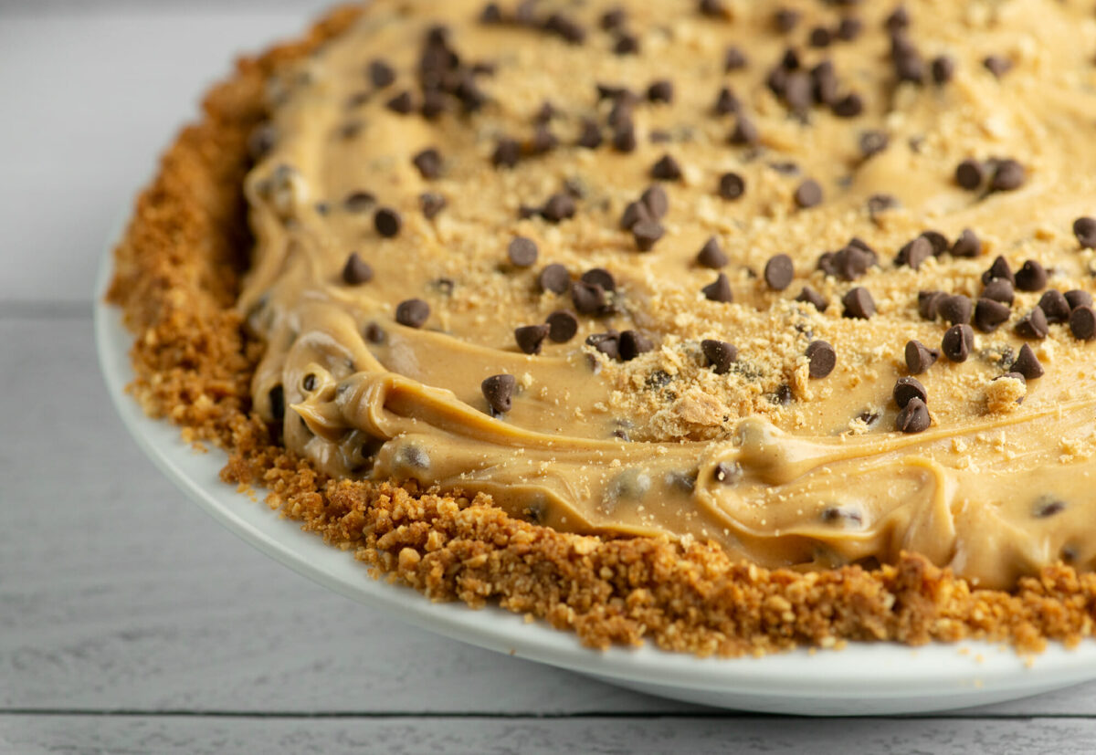 Chocolate chip peanut butter pie on a counter.