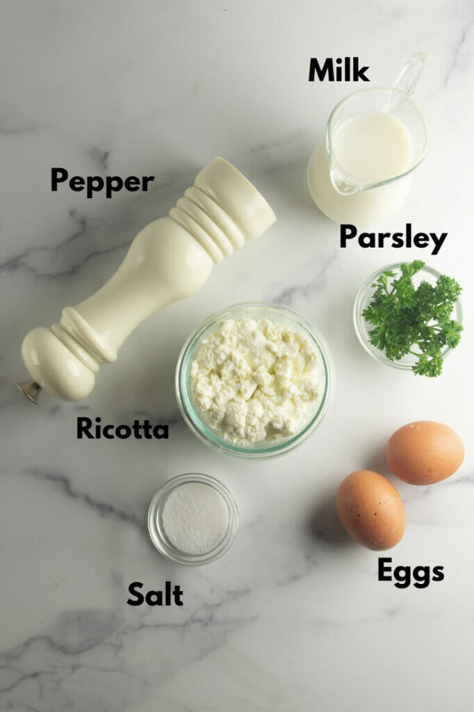 Ingredients needed to make scrambled eggs with ricotta cheese.