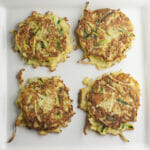 Zucchini fritters on a plate.