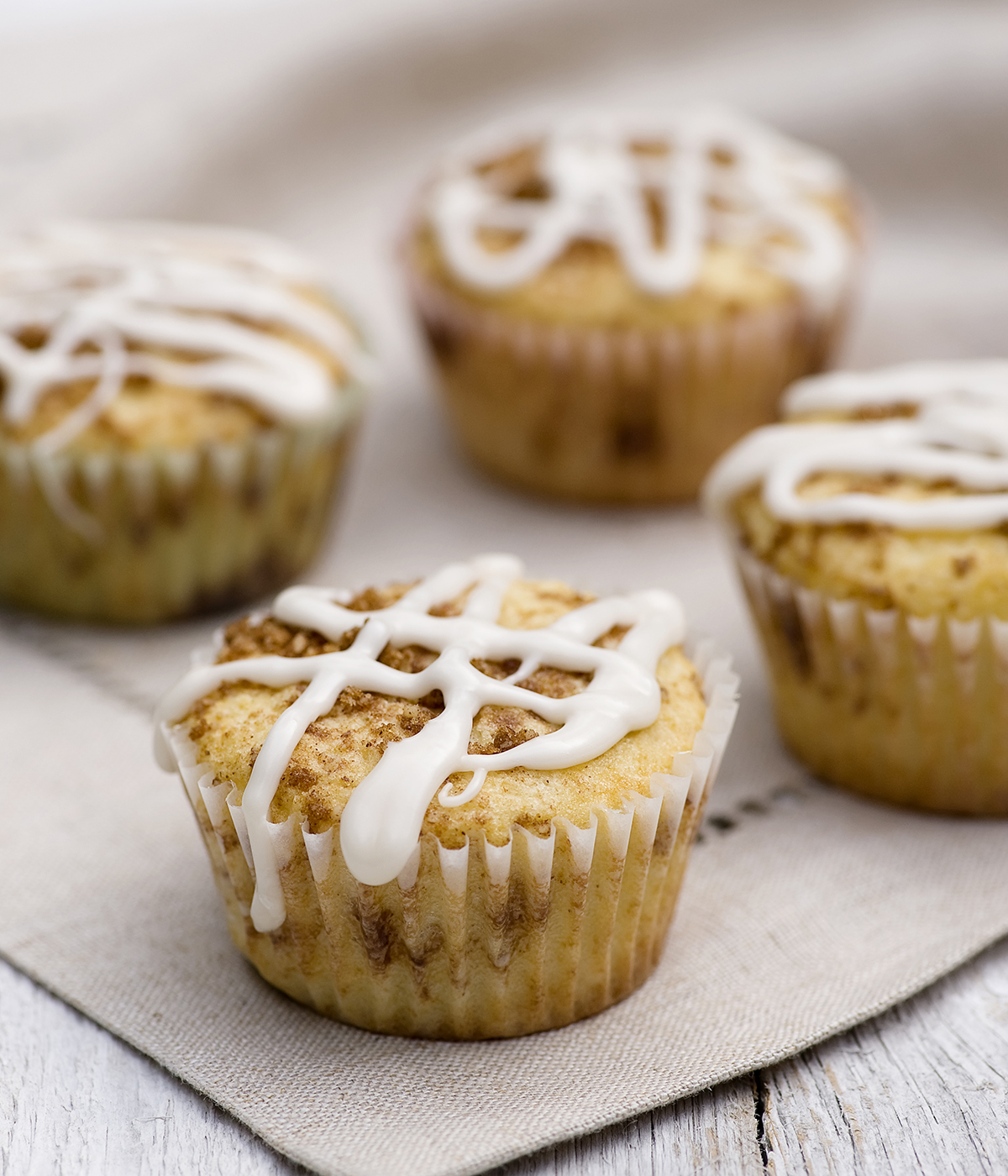 Glazed cinnamon roll muffins.