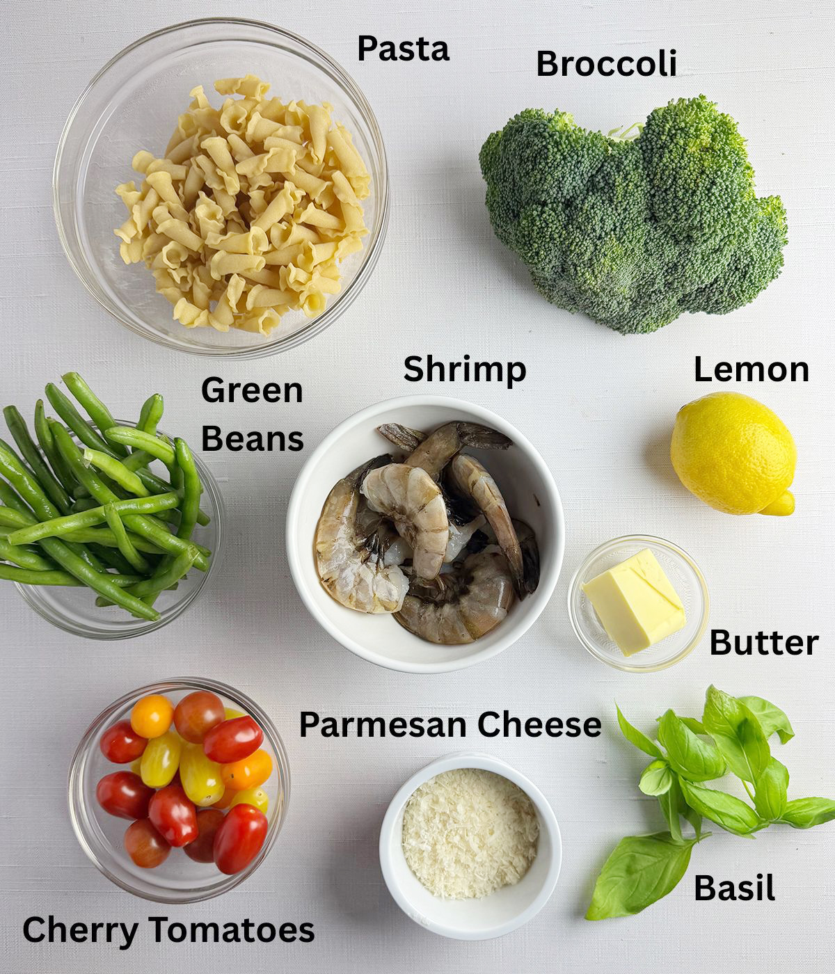 Ingredients needed for shrimp pasta primavera.