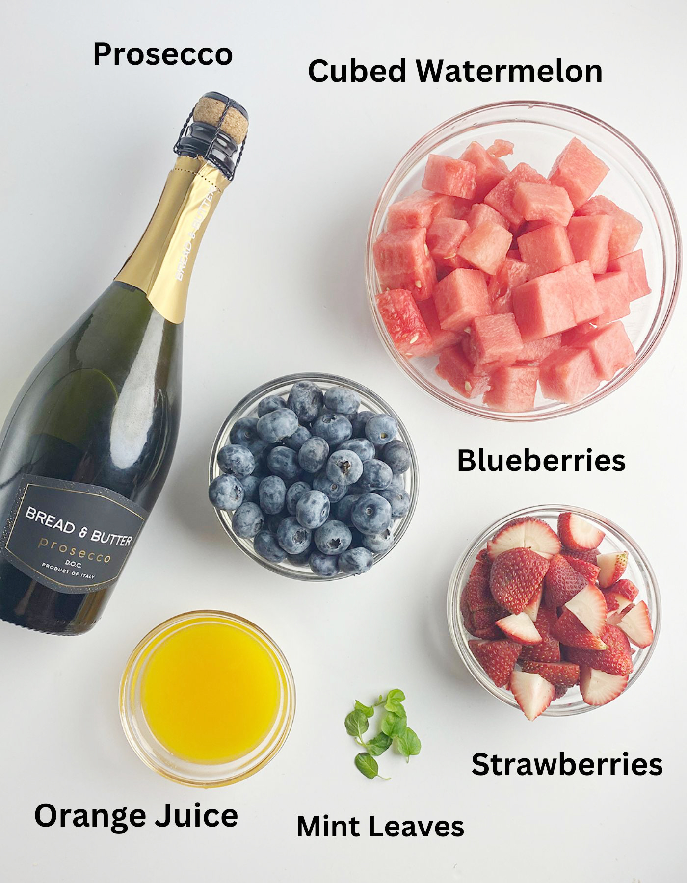 Mimosa fruit salad ingredients on the counter.