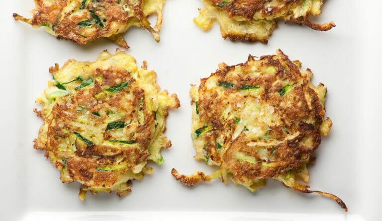 Zucchini Fritters on a plate.