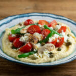 Chicken Hummus Bowls on a wooden counter.