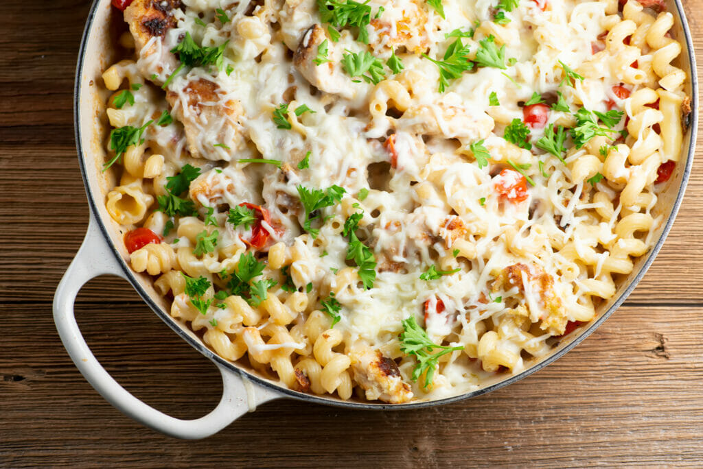 Creamy Chicken Parmesan Pasta in a skillet.