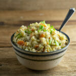 Stovetop Chicken and Rice in a bowl with a spoon.