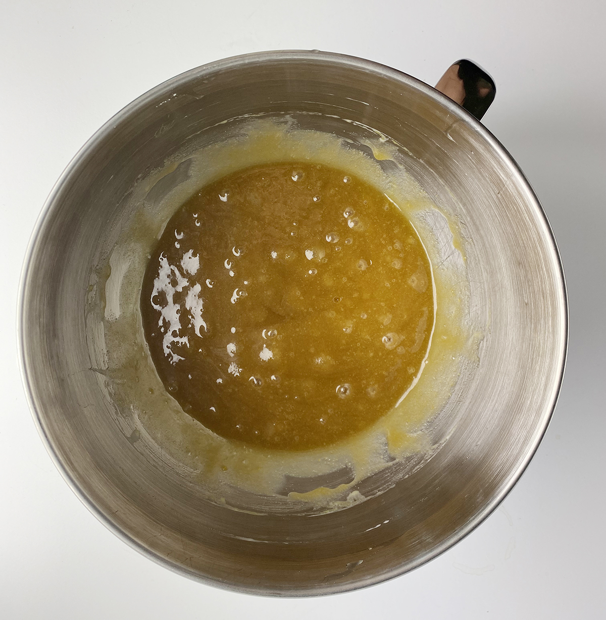 Sugar mixture for caramel apple cake in a bowl.